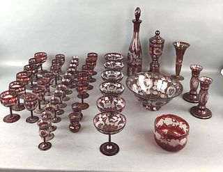 A Group of Ruby Red Glassware