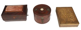 Group of Three English Boxes, 19th c., one a sewing box of sarcophagus shape with a top pin cushion, opening to a divided interior over a long side dr