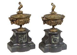 Pair of Bronze and Inlaid Marble Coupes, 19th c, the stork form handled lid over high relief floral, berry and leaf decorated sides, on a stepped shap