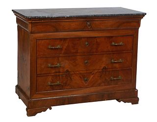 French Louis Philippe Carved Walnut Marble Top Commode, 19th c., the rounded corner highly figured gray marble over a cavetto drawer and three deep dr