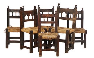 Set of Six Diminutive French Provincial Carved Beech Rushseat Dining Chairs, 19th c., the canted low back with a horizontal spindled splat, to a woven