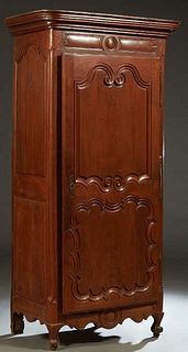 French Louis XV Style Carved Cherry Bonnetiere, the stepped rounded corner ogee crown over a double fielded panel door with iron fiche hinges and escu