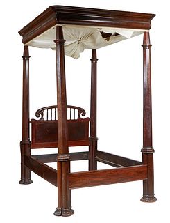 American Carved Mahogany Tester Bed, 19th c., the arched spindled headboard, flanked by turned and octagonal posts, joined by wood rails and a single 