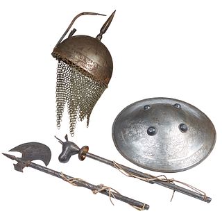 Four Pieces of Persian Iron Armor, 19th c., consisting of an axe; a helmet with a chain mail neck guard; a circular shield with incised decoration; an