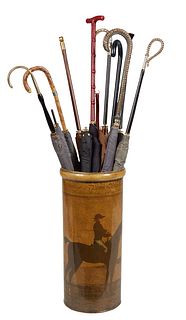 Tole Umbrella Stand, 20th c., with 11 lady's parasols with varying wood and metal handles, Stand- H.- 18 in., Dia.- 8 in., Largest Parasol- H.- 37 1/2