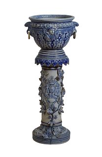Continental Salt Glazed Blue and Grey Stoneware Jardiniere and Pedestal, the jardiniere with relief male masks and applied ring handles, on a stepped 