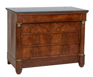 French Empire Carved Walnut Ormolu Mounted Marble Top Commode, mid 19th c., the figured black marble over a frieze drawer, three setback drawers and a