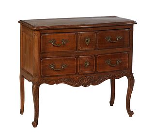 French Louis XV Style Carved Walnut Commode, the stepped bowed top over three frieze drawers and a lower deep drawer, on scrolled cabriole legs joined