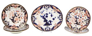Group of Six Royal Crown Derby "Imari" Porcelain Pieces, 19th c., consisting of 5 dinner plates and a large oval platter, all decorated in the Imari p