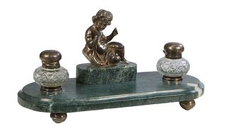 Silverplate Figured Green Marble Inkwell, 20th c., The stepped oval marble with a rear central silverplated relief figure of a child, flanked by two s