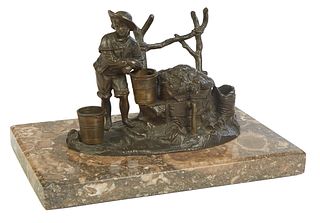 Patinated Bronze and Marble Figural Inkwell, 19th c. of a boy drawing water from a well, the lidded well for an ink pot, flanked by three pen stands a