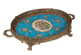 Large Bronze Mounted Oval Porcelain Handled Tray, 20th c., the floral decorated tray within a pierced brass gallery, on four splayed bronze paw feet, 