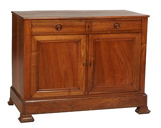 French Provincial Louis Philippe Carved Walnut Sideboard, 19th c., the rectangular top over two frieze drawers, above double cupboard doors, on a plin