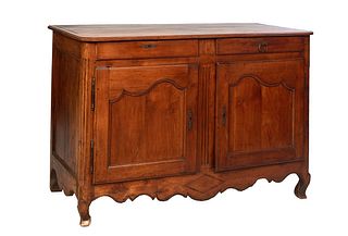 French Provincial Carved Walnut Louis XV Style Sideboard, 19th c., the stepped rounded corner top over two frieze drawers above double cupboard doors 