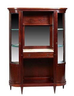 Unusual French Louis XVI Style Carved Walnut Curved Glass Vitrine, 20th c., the rounded breakfront top over a central open area with a shelf above a w