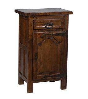 French Provincial Carved Walnut Confiturier, late 19th c., the rectangular top over a frieze drawer and a fielded panel cupboard door, with iron strap