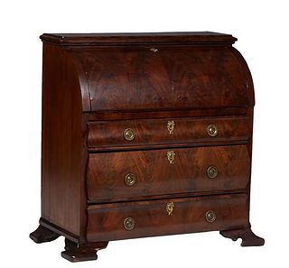 Continental Carved Mahogany Faux Cylinder Top Secretary, 19th c., the stepped rectangular top over a cylinder fall front writing surface opening to an
