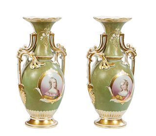 Pair of Continental Porcelain Baluster Portrait Vases, 19th c., the scalloped top above gilt handles and female portrait reserves, on a green ground, 