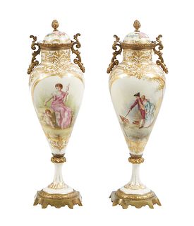 Pair of Sevres Style Hand Painted Porcelain and Gilt Bronze Covered Garniture Urns, late 19th c., on a white ground, each with a hand painted figural 