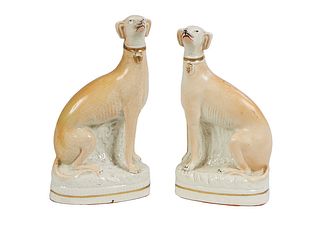 Pair of English Staffordshire Greyhounds, 19th c., on integral bases, H.- 8 in., W.- 4 1/4 in., D.- 2 3/8 in.,
