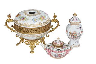 Three Pieces of Porcelain, 19th c., consisting of a porcelain and bronze parfumier, with floral decoration, with a crossed swords mark; a Samson balus