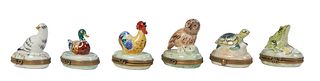Group of Six French Hand-Painted Limoges Porcelain Pill Boxes, 20th c., four with relief bird decoration, one with a turtle, and one with a frog, H.- 