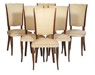 Set of Six Art Deco Carved Walnut Dining Chairs, c. 1940, the high canted serpentine back over a curved seat, on square cabriole legs, in beige vinyl 