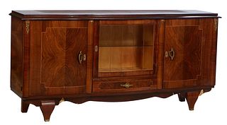 French Art Deco Inlaid Ormolu Mounted Walnut Sideboard, 20th c., the stepped serpentine top over a curved glazed five panel cupboard door, above a low