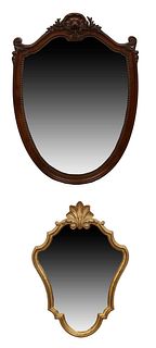 Two French Mirrors, 20th c., one gilt cartouche shaped example with a leaf surmount, H.- 30 in., W.- 20 1.2 in., D.- 1 1/2 in.; together with a shield