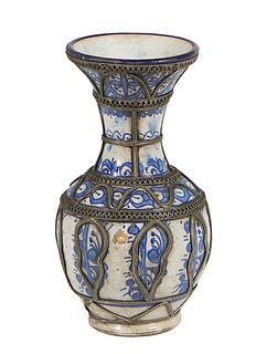 Persian Metal Clad Baluster Earthenware Vase, 19th c., with blue and white decoration, signed on the underside, H.- 9 1/8 in., Dia.- 5 in.