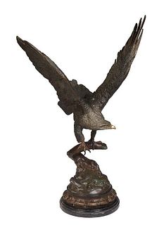 After Jules Moigniez (1835-1894, French), "Eagle Landing on a Branch," 20th c., patinated bronze with an impressed signature verso, on an integral ste