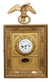 Continental Gilt Picture Framed Wall Clock, 19th c., with a carved eagle surmount, with an enamel dial and a time and strike movement clock, in a gilt