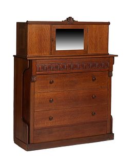 American Carved Oak Murphy Bed, early 20th c., with a mirror door cupboard over a fold out faux drawer chest, enclosing a mattress, H.- 76 in., W.- 55
