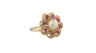 Lady's 14K Yellow Gold Dinner Ring, with a center 7mm white cultured pearl, flanked by a swirled pierced border mounted with eight round five point ru