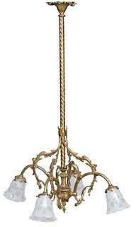American Brass Four Light Chandelier, early 20th c., the twisted support issuing four arched leaf relief arms with faux candle sockets, with later fro