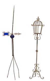 Two Wrought Iron Pieces, early 20th c., consisting of a lightening rod with a blue glass mounted weathervanes; together with a standing iron lantern w
