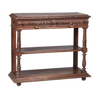 French Henri II Style Carved Oak Marble Top Server, c. 1880, the lifting lid with a folding shelf, over an inset highly figured rouge marble, above tw