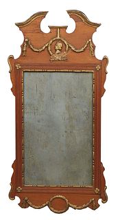 Diminutive English Carved Mahogany and Parcel Gilt Chippendale Style Mirror, late 19th c., the broken arch top over an applied decoration, above a rec