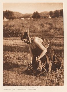 Edward S. Curtis, Offering Pipe to the Earth - Cheyenne, 1910