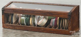 Oak country store counter top ribbon case, late 19th c., 6 1/2'' h., 19 1/4'' w.