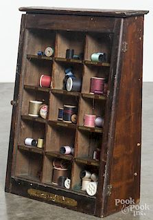 Baribeau & Sons Canada spool display case, ca. 1900, 20 1/2'' h., 14 1/2'' w.