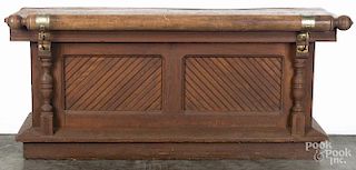 Oak country store counter, ca. 1900, with sunken panels and a turned top rail, 32'' h., 72 1/2'' w. 28