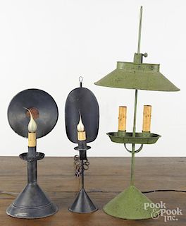 Three contemporary tin table lamps, tallest - 24''. Provenance: Barbara Hood's Country Store