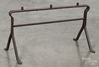 Pennsylvania wrought iron fire tool rest, early 19th c., 14'' h., 27'' w.
