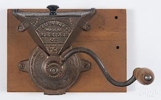 Charles Parker cast iron wall mounted spice grinder, 19th c., no. 350, 6 1/2'' h.