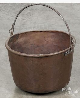 Large copper bucket, 19th c. with an iron swing handle, 11 1/2'' h., 17'' dia.