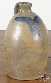 Pennsylvania stoneware jug, 19th c., with cobalt floral spray, 11 3/4'' h.