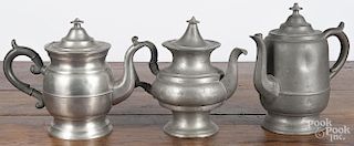 Three American pewter teapots, ca. 1840, one marked H.B. Ward of Wallingford, Connecticut