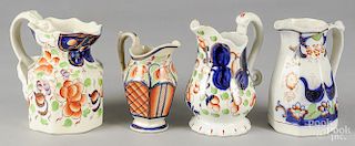 Four Gaudy Welsh pitchers, patterns to include Ducks, Ragland, Ceyln, and Gower