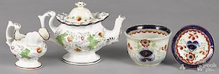 Strawberry pattern teapot and creamer, together with a Gaudy Welsh ironstone waste bowl and saucer